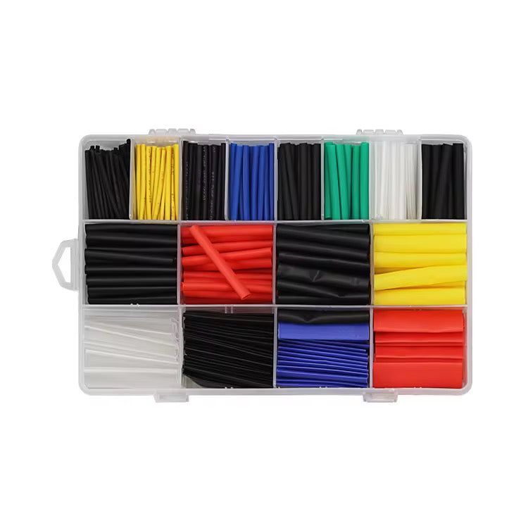 Set of colorful heat shrink tubing in a clear plastic case on a white background