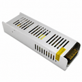 Rectangular silver power supply unit with a yellow label on a white background